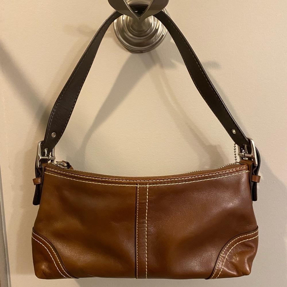 Coach purse, brown leather.  Approx. 10 inches long.